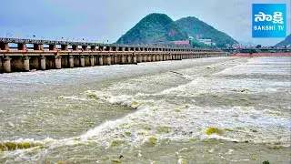 Massive inflow To Prakasam Barrage | 1st ప్రమాద హెచ్చరిక | First Flood Warning Issued | @SakshiTV