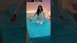 Woman Relaxing in Real Water Bed ASMR 🌊 | Satisfying Turquoise Liquid Bed #shorts