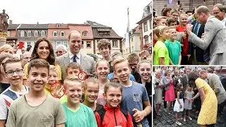 Did two German boys make a rude gesture while posing with Kate and Wills?