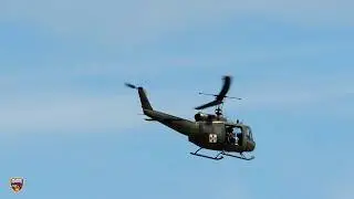 American Huey 369 flying over Sheboygan