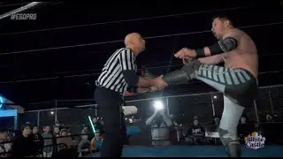 Referee Brian Allen hits Robert 