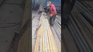 Real shots of the construction site: tying steel pipes also requires 
