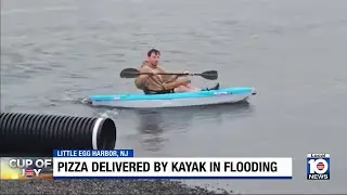New Jersey pizza delivery guy kayaks through flooding to reach customer&rsquo;s home