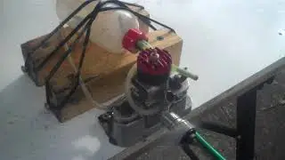 An early McCoy 35 glow two stroke stunt engine, nice runner!