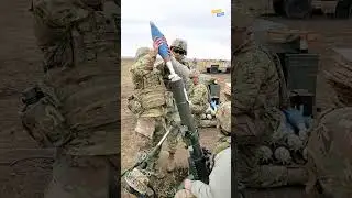 Female Tomahawk Task Force soldier fires a 120mm mortar