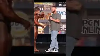 Ramon Dino put his arm in the face of the number one in the world. #ramondino #chrisbumstead #cbum