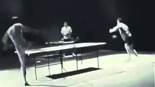 Bruce Lee using Nunchukus to defeat opponent in Ping Pong Game