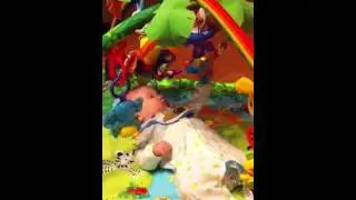 James Marc playing on his floor mat