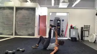 Cross crunch toe touch