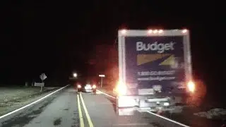 This driver miss his right turn and wanted to back up all the way to his missed exit