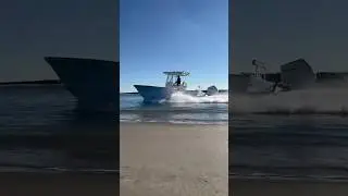 Billfish 26&rsquo; center console running beachside with a single 300 Mercury V8!