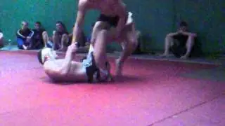 Martin Aedma recieves BJJ black belt from John Kavangh while flowrolling with Gunnar Nelson