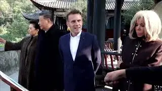 Xi, Macron visit ancient dam in rare trip outside Beijing | REUTERS