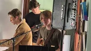 John Strong Performing 