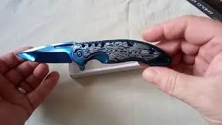 Anglo Arms Titanium Blue Folding Knife.