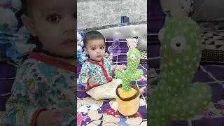 baby reaction on dancing cactus #cutebaby #babycare #viral #papa #trending #dancing #cactus #love