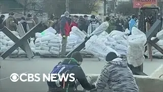 Kyiv under siege as Ukrainians spend another night sheltering