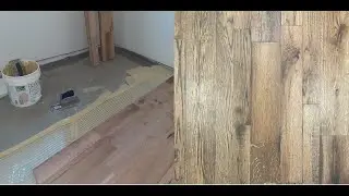 Installation of glue down engineered reclaimed oak hardwood floor over radiant heat slab concrete