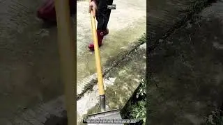 Removing Weeds From Concrete Cracks Outdoors Using Work Tool Manual Weed Scraper #tool #worktool