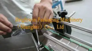how to adjust turn table for different bottle size