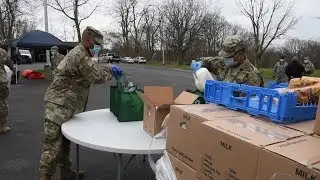 Members of the New York National Guard support civil authorities with food distrobution