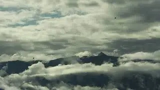 Enchanting Symphony: Clouds, Fog, and Wind Unite in a Mesmerizing Nature Ballet 🌬️☁️🌫️