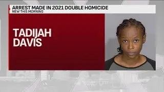 Woman arrested in connection with 2021 double murder