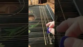 Blue on Black /KWS/ on guitar zither.