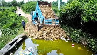 Finish laying stones to repair roads that were badly damaged by rain and large vehicles.