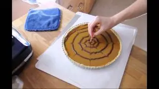 How to Make a Spiderweb Design on Baked Goods - from Baking Bites