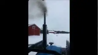 Ford 5610 mk2 -86 with some smoke while plowing snow.
