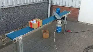 overzet arm/ riem voor het maken van een hoek op een transportband.