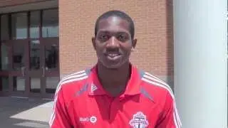 Doneil Henry visits his middle school