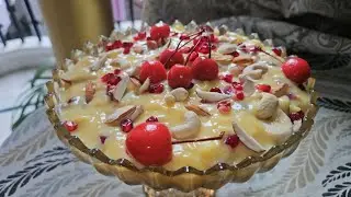 Fruit custard 🍮 with dry fruits 😋 👌 Please like Comment and share subscribe 