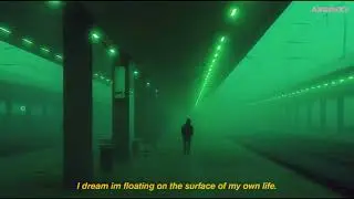 i dream im floating on the surface of my own life.