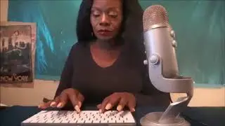 woman typing on keyboard while chewing gum (the chew asmr)