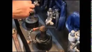 Optical lens grinding