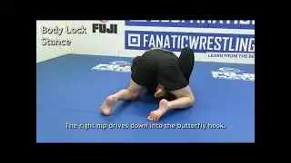 Body Lock Pass: Stance and stability. Proper base and weight distribution, preventing sweep.