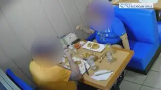 Surveillance video shows couple planting hair to get free meal