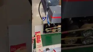 CO2 Flying Laser marking machine with sealing machine for date coding on candied haws packaging bags