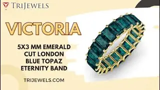 Victoria 5x3 mm Emerald Cut London Blue Topaz Eternity Band 14K Yellow Gold