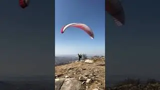 Spicy Paraglider launch on South Korean cliff