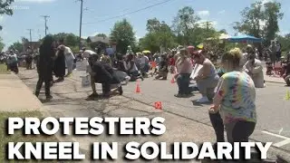 Arkansans kneel in solidarity during 8th day of Little Rock protests