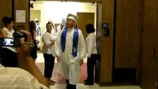 Erin walking in for her graduation