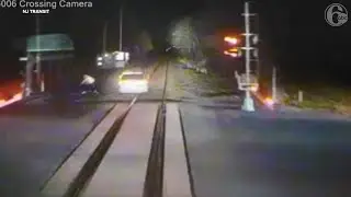 CLOSE CALL: Video shows driver dash to safety before train crash