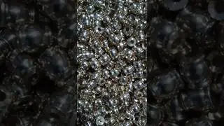 Unpacking gold to show jewelry necklace making in beads collection