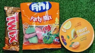 ASMR unboxing sweets: assorted marmalade and Twix chocolate sticks