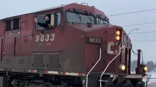 Friendly Wave!!! CP 9833 Leads CP 568 (Crude Oil Empty&rsquo;s) North at Turner Calgary AB.