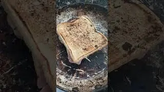 Off Grid Cooking Bacon and onion toastie with doorstep bread toasted