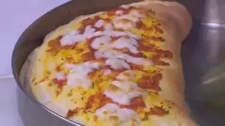 طريقة عمل بيتزا محشية بسطرمة |  نجلاء الشرشابي